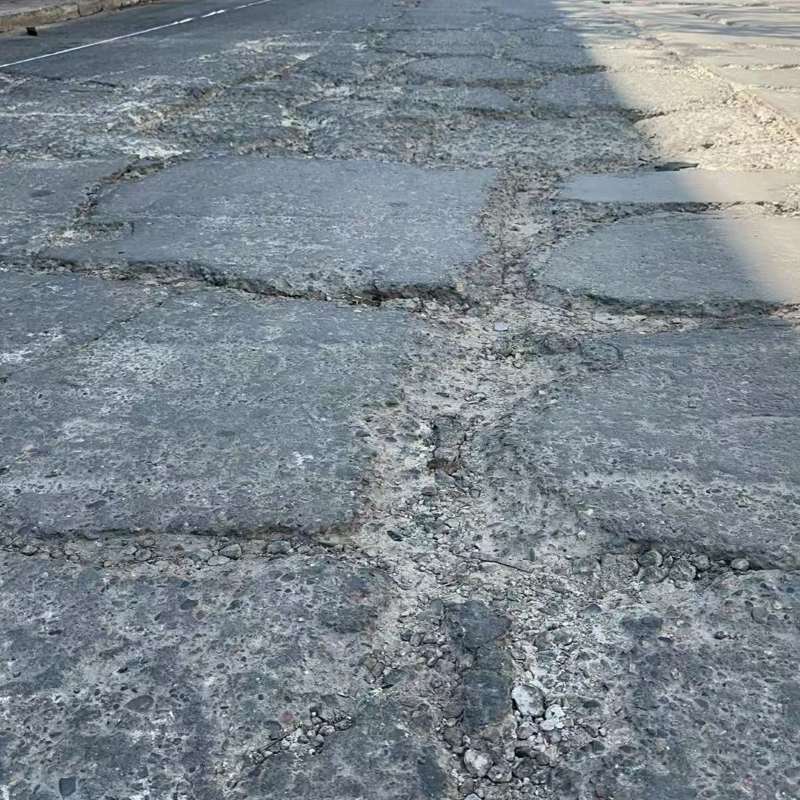 利津路面起砂露石子修补料